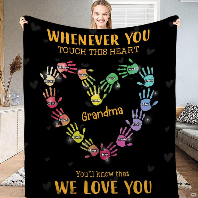 Bedding set displaying a multicolored handprint thematic accent wreath and golden typography on a black background.