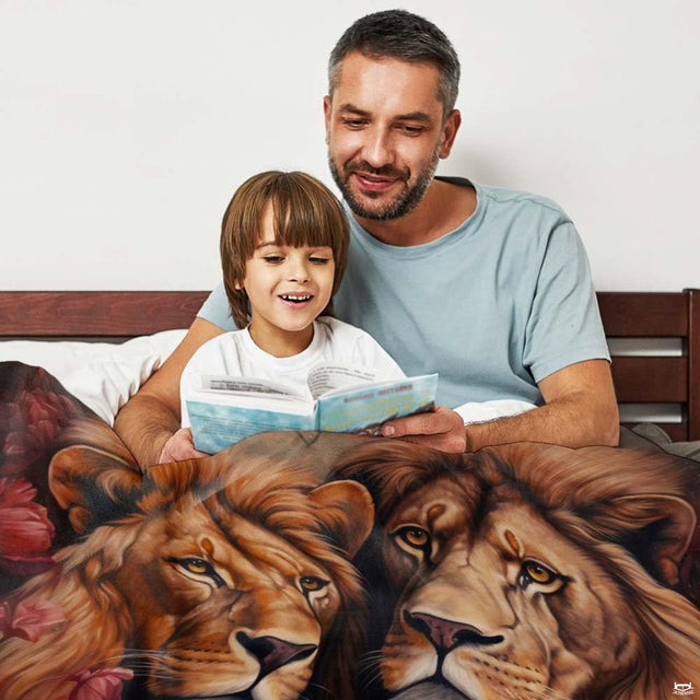 Woman holding open two male lions floral peonies throw blanket in modern room