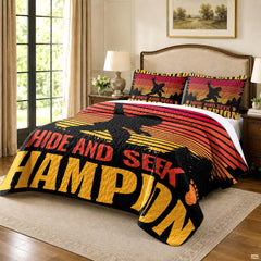 Close view of Sasquatch silhouette and paw footprints on a dark wilderness sunset bedding set.
