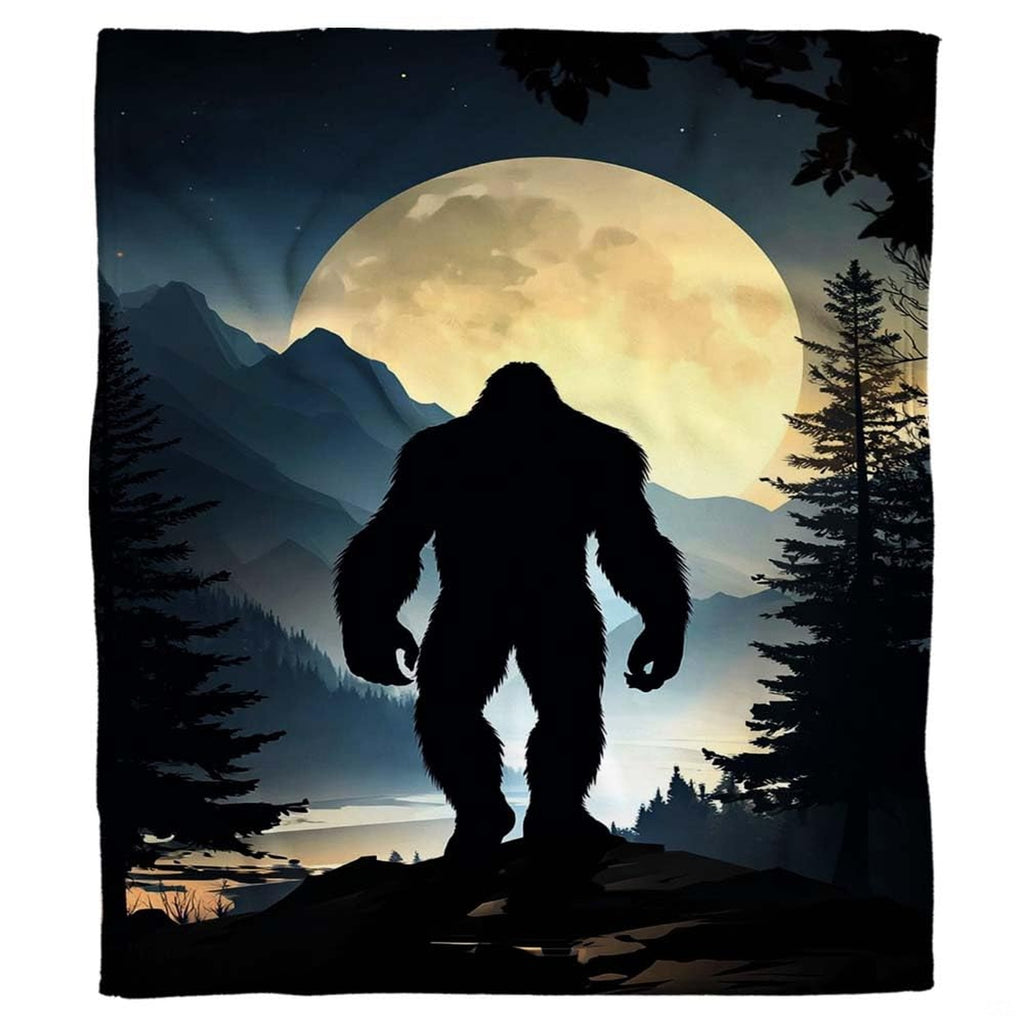 Night sky and alpine pine tree silhouette backdrop on mountain lodge bedding decor.