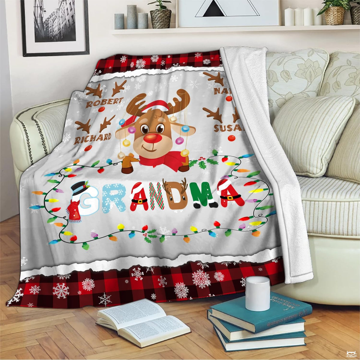 Lifestyle room setting featuring Christmas reindeer throw blanket accenting holiday home decor