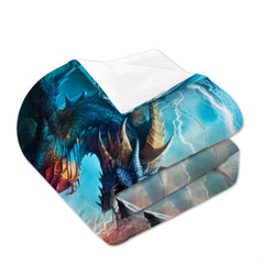 Folded bedding with horned blue dragon, claw, lightning, and white reverse