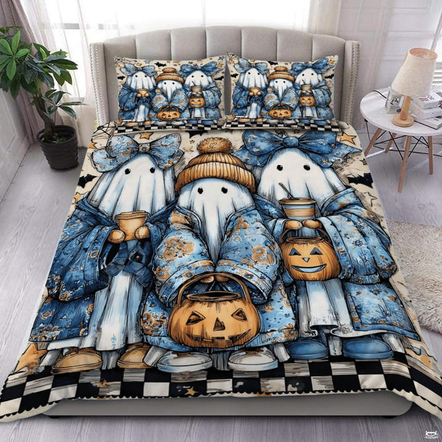 Overhead bedroom view displaying trick-or-treat ghost trio bedding with matching pillowcases.