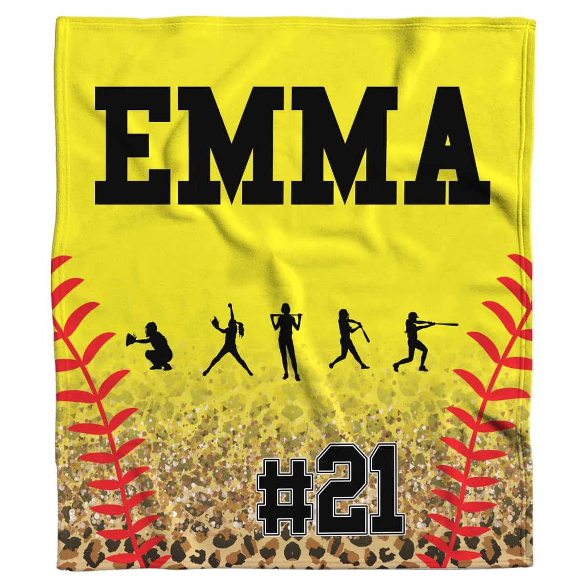 Close view of five softball player silhouettes and red ball laces on blanket