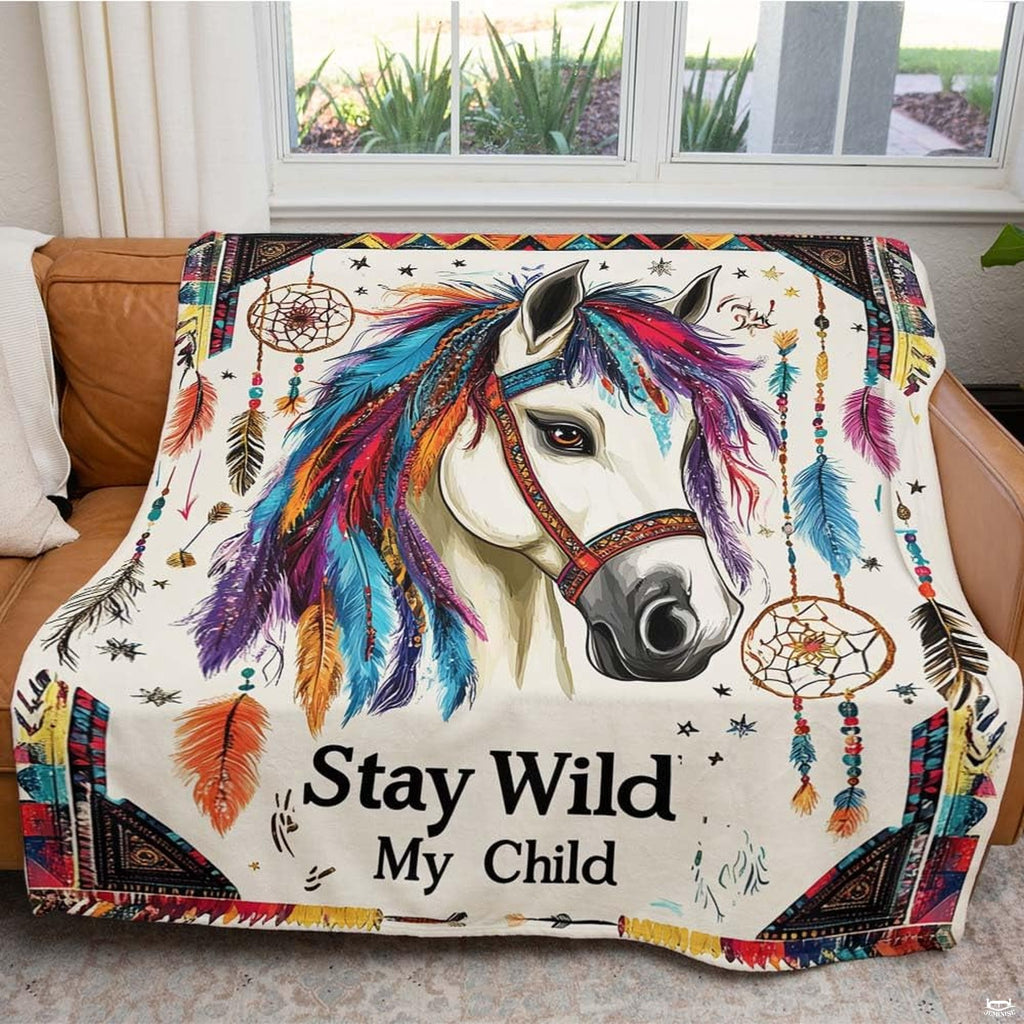 Southwestern ranch living room setting featuring tribal horse throw blanket on sofa