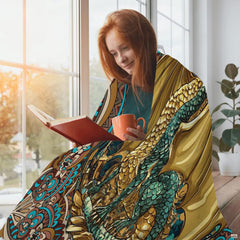 Coordinated pillow arrangement highlighting intricate amber and teal bohemian dragon art.