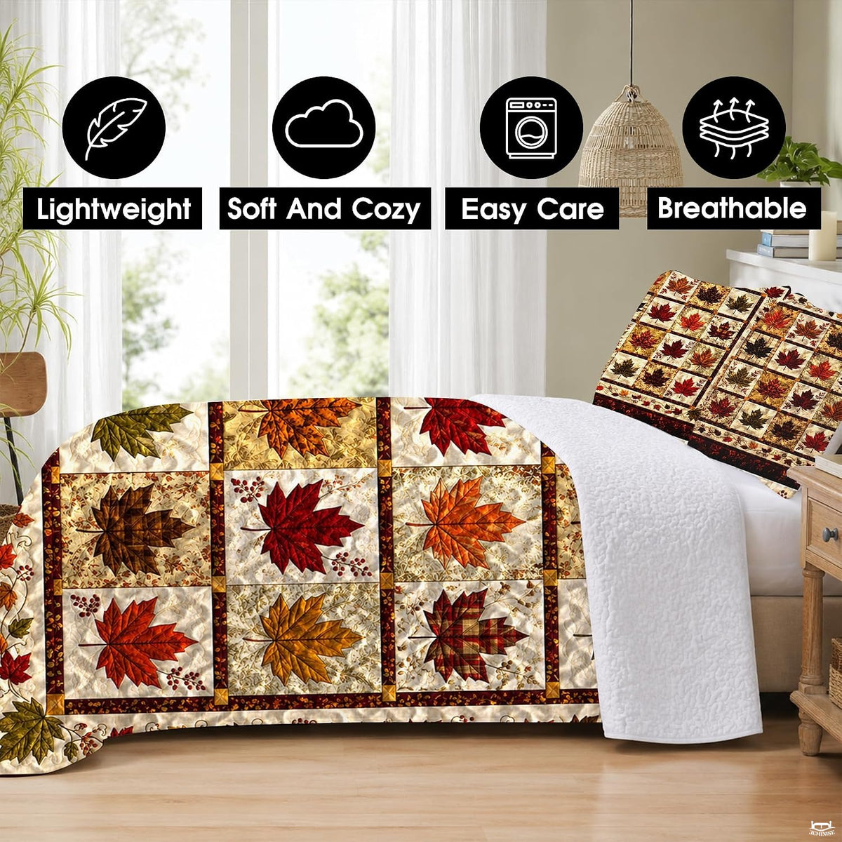 Matching pillow shams displaying a miniature maple leaf patchwork grid on a bedding set