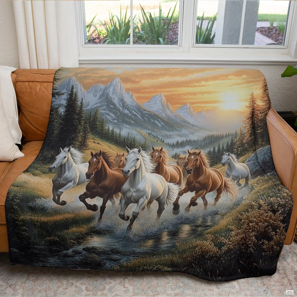 Wild horses mountain landscape print draped across modern indoor seating.
