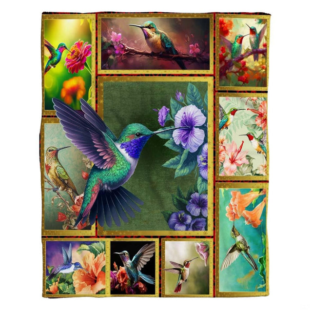Central golden-framed panel showing emerald hummingbird sipping purple hibiscus on hummingbird bed sheets.