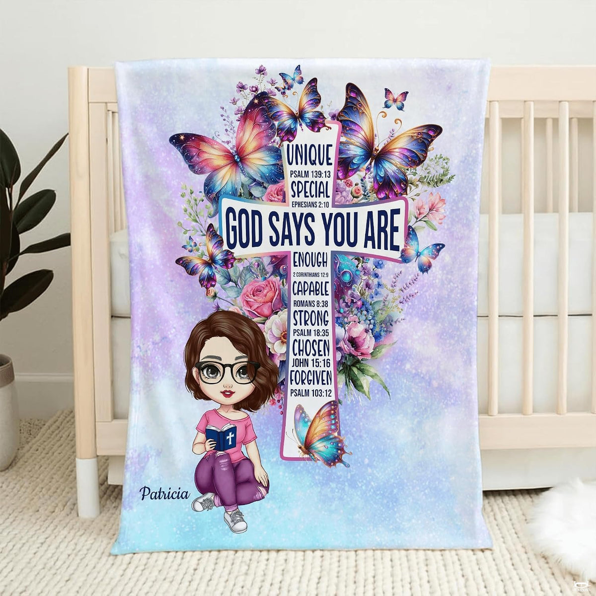 Christian cross butterflies floral blanket draped over nursery wooden crib