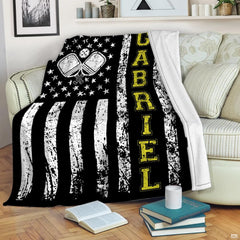 Distressed American flag graphic with crossed pickleball paddles and yellow lettering, view 1.