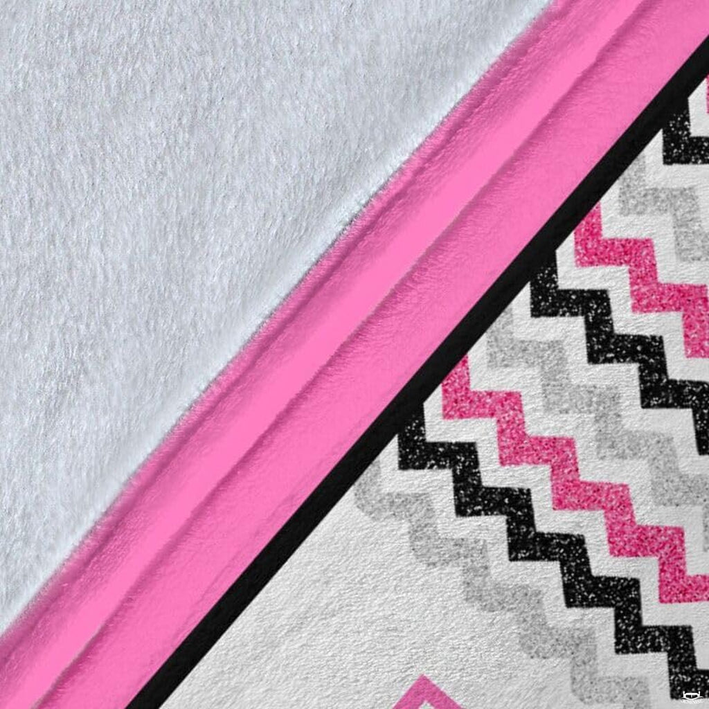 Lifestyle interior presentation of girls wrestling collage blanket in a modern room.