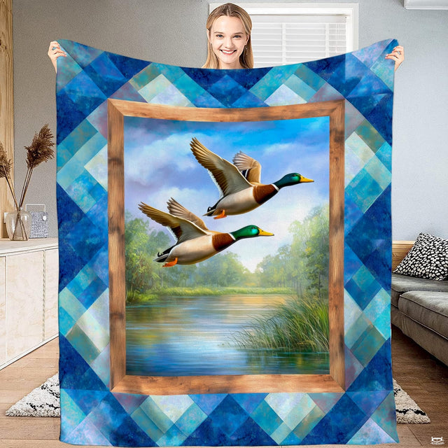 Mallard ducks in flight over marsh lake framed by rustic wood and teal diamond patchwork bedding visual.
