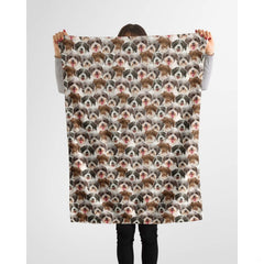 Havanese photo collage blanket styled across a couch in a bright living room.