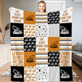 Sprint car racing patchwork throw blanket featuring winged dirt track race cars, chevrons, and checkered flag motifs