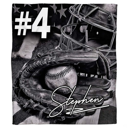 Baseball catcher throw blanket featuring black and white sketch of catcher mitt, baseball, and helmet mask