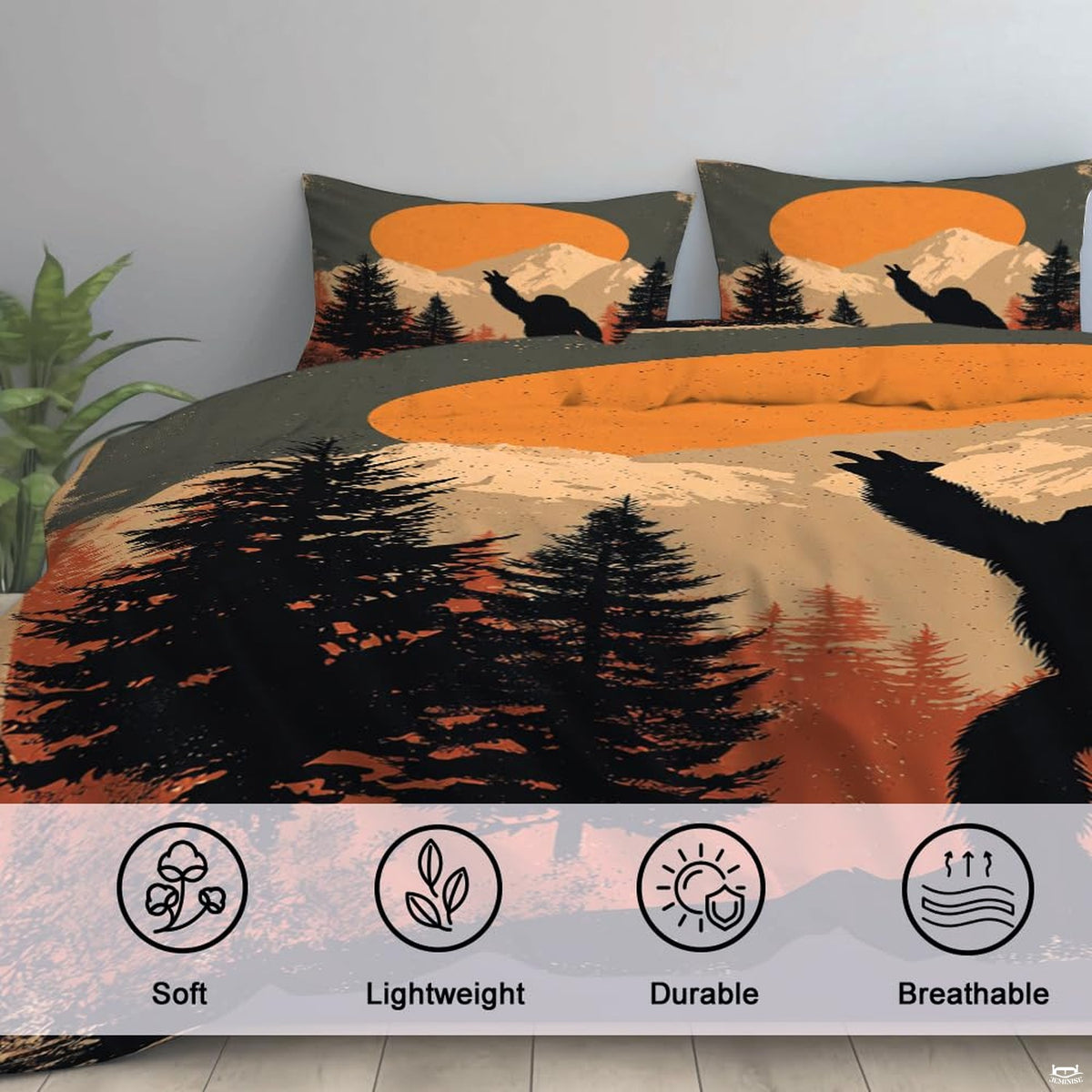 High-angle view of bigfoot graphic bedding showing rich terracotta, amber, and obsidian tones across bed.
