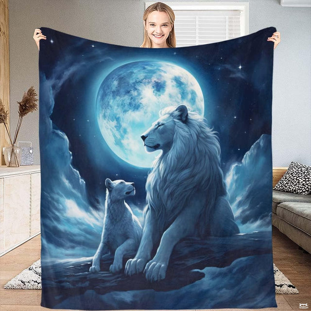 White lion and cub moonlight throw blanket showing lion family under giant blue moon