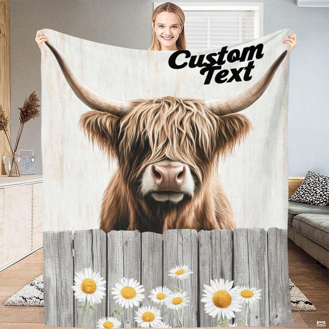 Rustic daisy fence Highland cow throw blanket featuring shaggy cow over wooden fence with daisies
