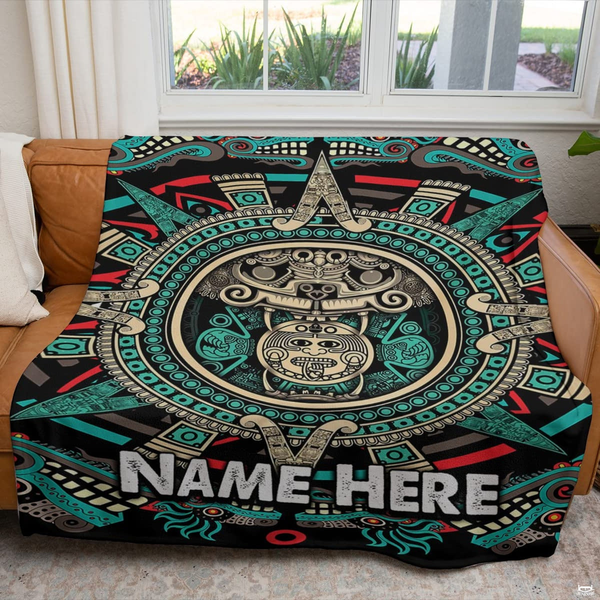 Detailed view of ornate tribal glyphs and teal accents on the aztec print bedding set illustration.