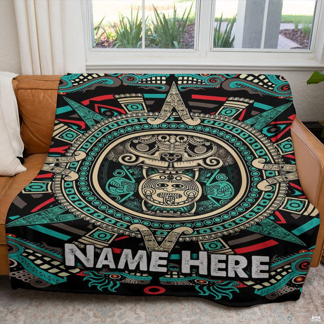 Detailed view of ornate tribal glyphs and teal accents on the aztec print bedding set illustration.