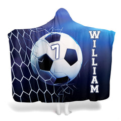 Graphic layout of soccer design with ball bursting through goal net and vertical varsity typography.