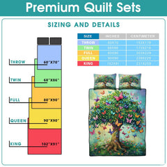 High-angle view of tree of life bedding set showcasing balanced geometric patchwork tiles and nature artwork across bed.