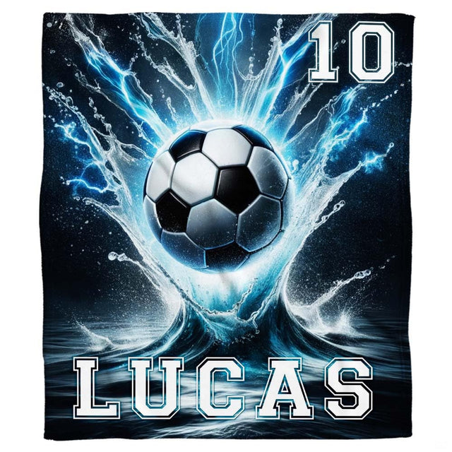 Water splash soccer ball graphic textile laid flat in studio overview