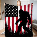 Bigfoot sasquatch american flag forest blanket held upright by model