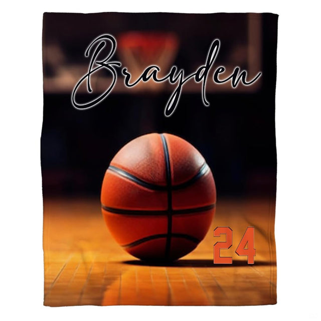Basketball on hardwood court sports throw blanket showing ball on gym floorboards