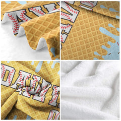 Close-up perspective of sweet waffle ice cream print showing pastel blue frosting melts and baseball thematic accent texture.