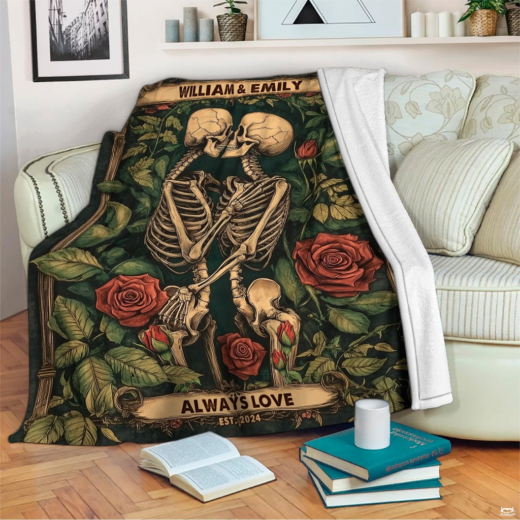Bedroom lifestyle setting showing the eternal skeletons rose blanket styled on a bed.