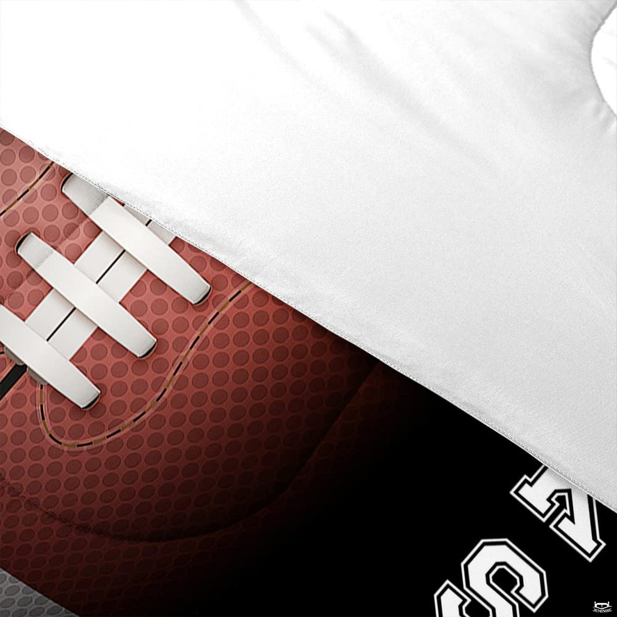 Matching pillow sham detail for split football bedding set displaying varsity numerals in bedroom setting