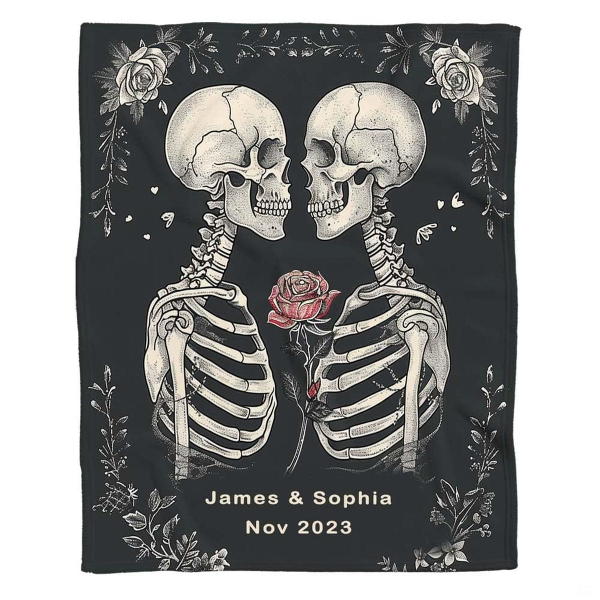Flat front display of gothic skeleton lovers holding red rose on charcoal.