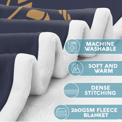 Ship wheel helm throw blanket folded neatly showing navy ground and golden rope band accents