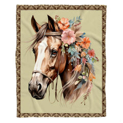 Close-up perspective of peach and pink floral garland woven into horse mane blanket