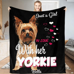Living room sofa display showing the black Yorkshire Terrier canine throw blanket draped over furniture.