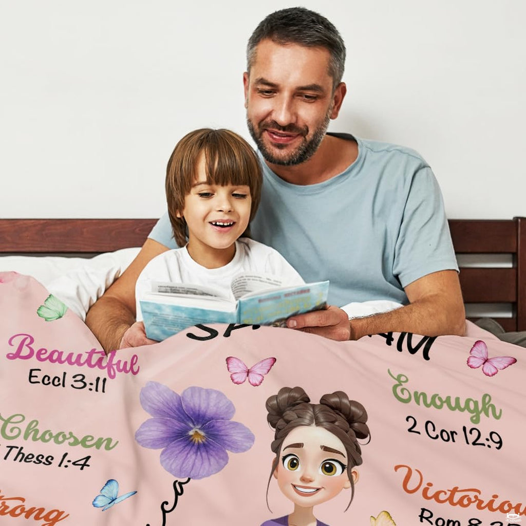 Close view of scripture verses and floral border on graphic blanket
