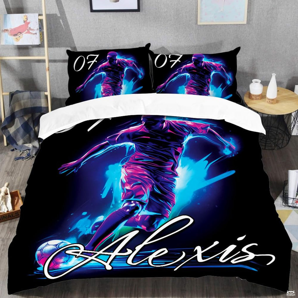 Top-down view of indigo and cobalt football bedding set arranged neatly on a youth bedroom mattress