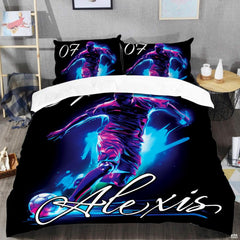 Top-down view of indigo and cobalt football bedding set arranged neatly on a youth bedroom mattress