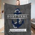 Nautical navy anchor rustic wood throw blanket featuring a blue anchor over grey wood parquet planks