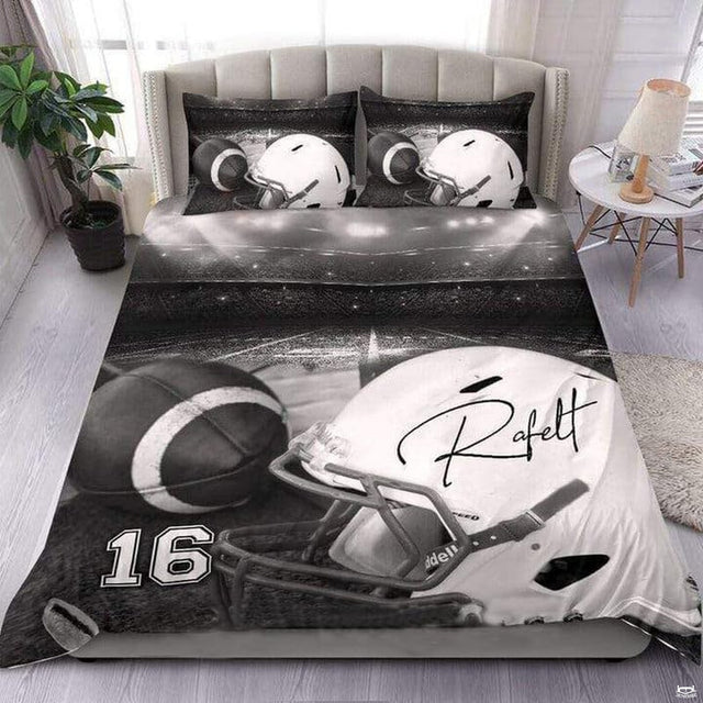 Platinum silver football sports bedding featuring textured football graphic and yard lines on a bed