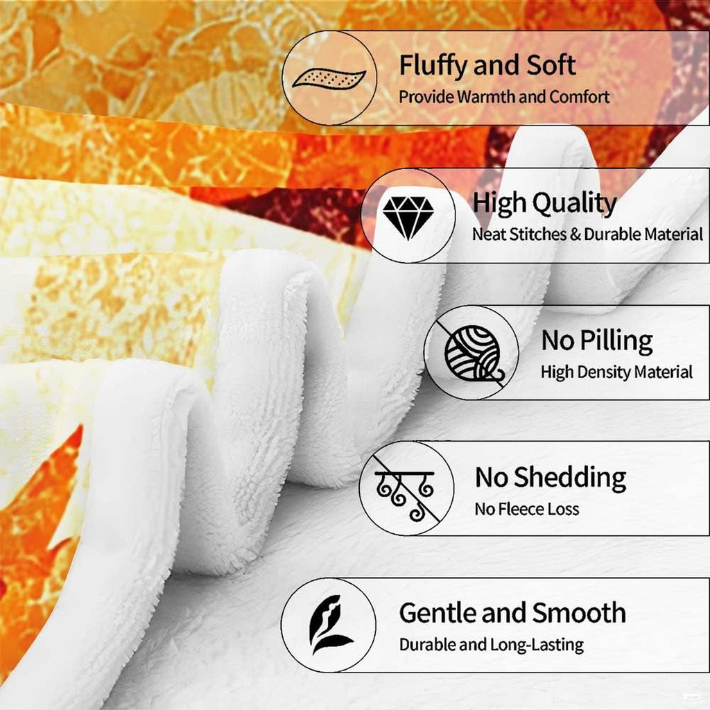 Overhead flat view of three quilted patchwork pumpkins throw blanket