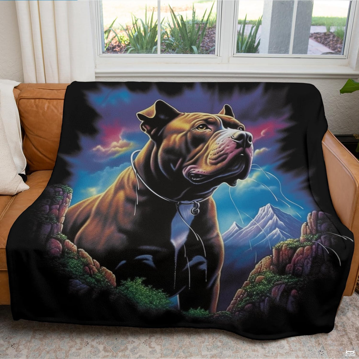 Folded majestic mountain pitbull throw blanket resting on wooden bench displaying rich sunset colors