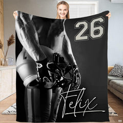 Football player helmet monochrome throw blanket displaying black and white athlete portrait