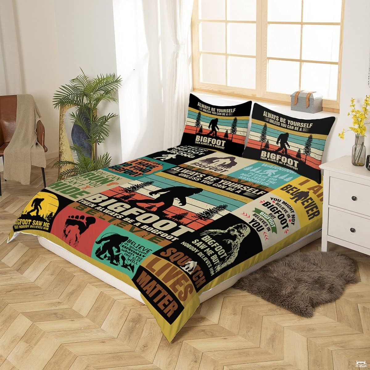Close view of mustard, teal, beige, and burnt orange sunset stripes featuring a dark woodland creature silhouette.