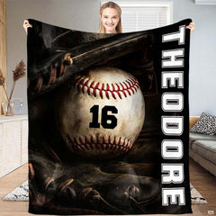 Baseball resting inside a dark fielder glove beside vertical white varsity lettering, view 2.