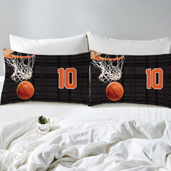 Folded corner view showing basketball orange and jet black court pattern on athletic bedding