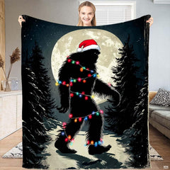 Bigfoot in a Santa hat wrapped in colorful Christmas lights under a full moon, view 1.