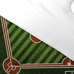 Folded presentation of baseball helmet bedding displaying sharp graphic clarity in olive and amber tones